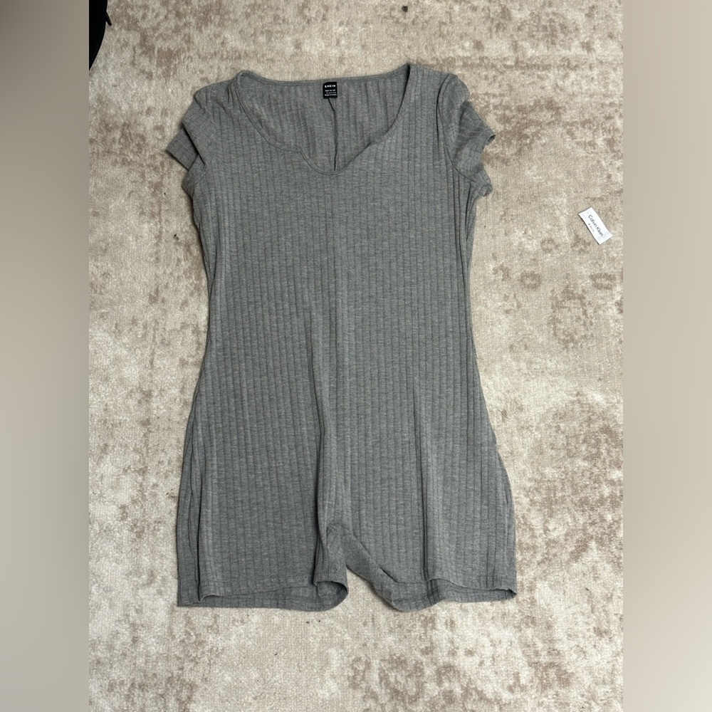 Bundle jumpsuit and two skirts